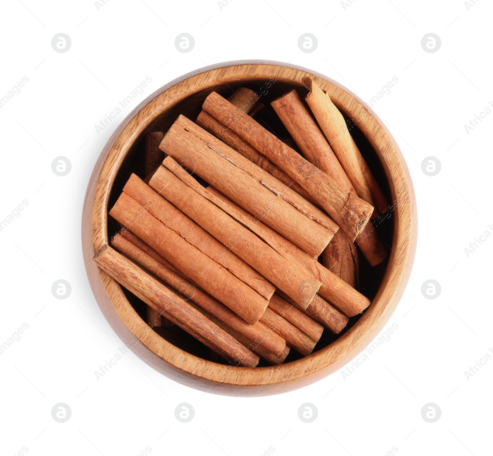 Photo of Cinnamon sticks in bowl isolated on white, top view