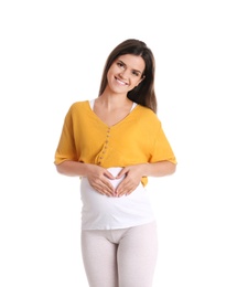 Happy pregnant woman posing on white background