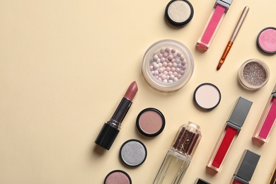 Photo of Beautiful composition with lipsticks on color background, flat lay. Space for text