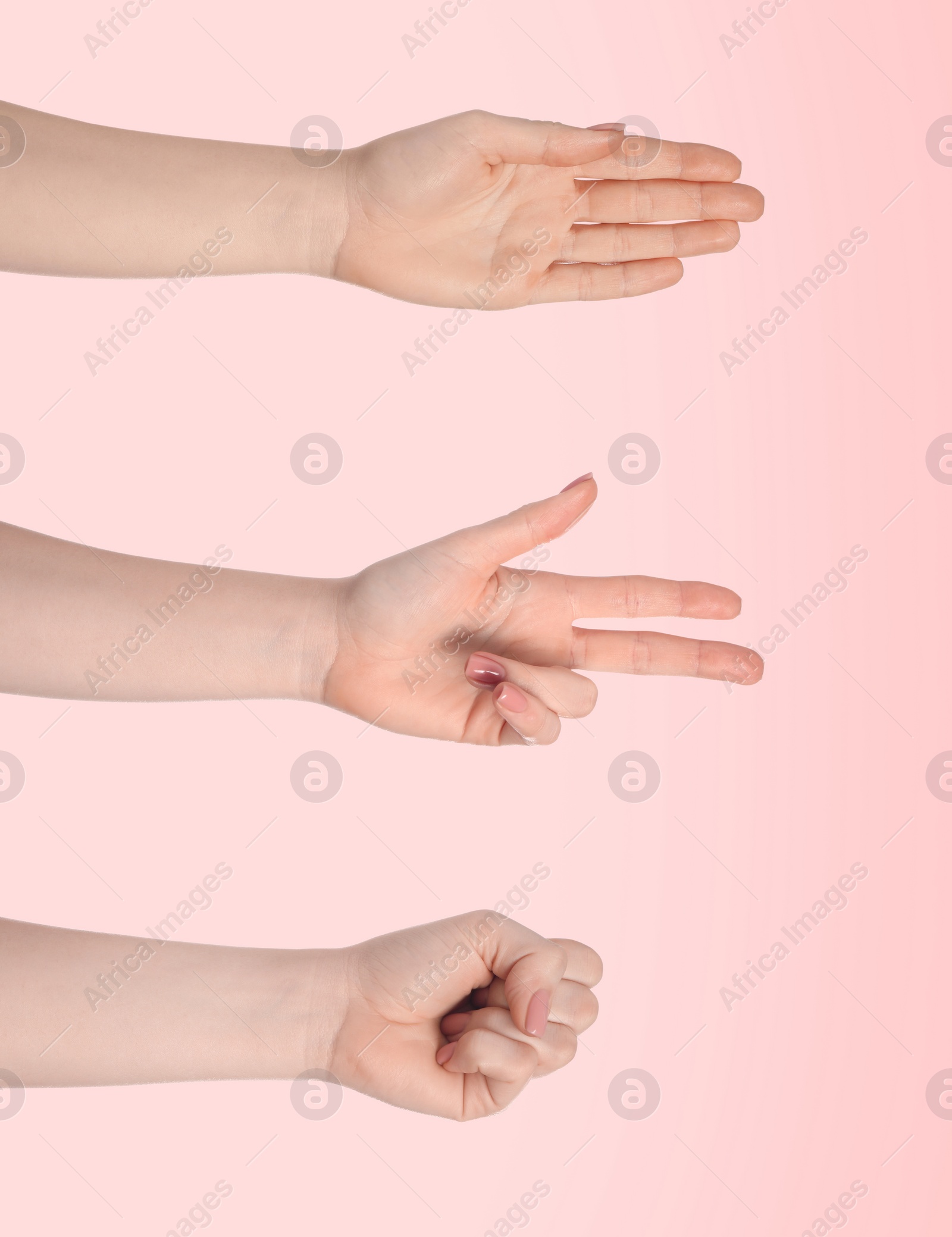 Image of People playing rock, paper and scissors on pink background, closeup