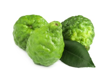 Photo of Fresh ripe bergamot fruits and leaf on white background