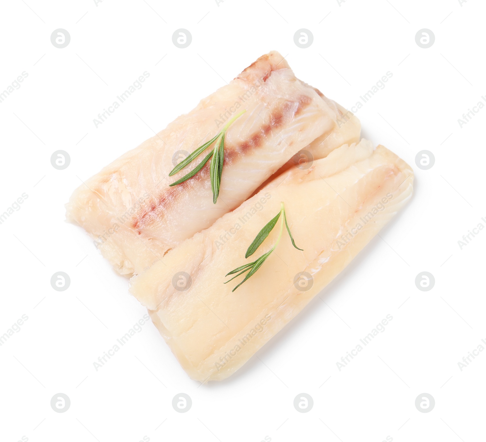 Photo of Pieces of raw cod fish and rosemary isolated on white