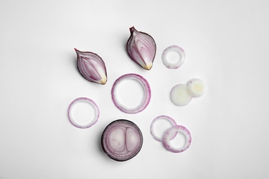 Photo of Beautiful composition with ripe red onions on white background