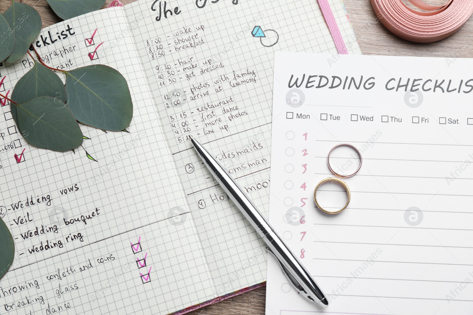 Photo of Flat lay composition with Wedding Checklist and planner on wooden table