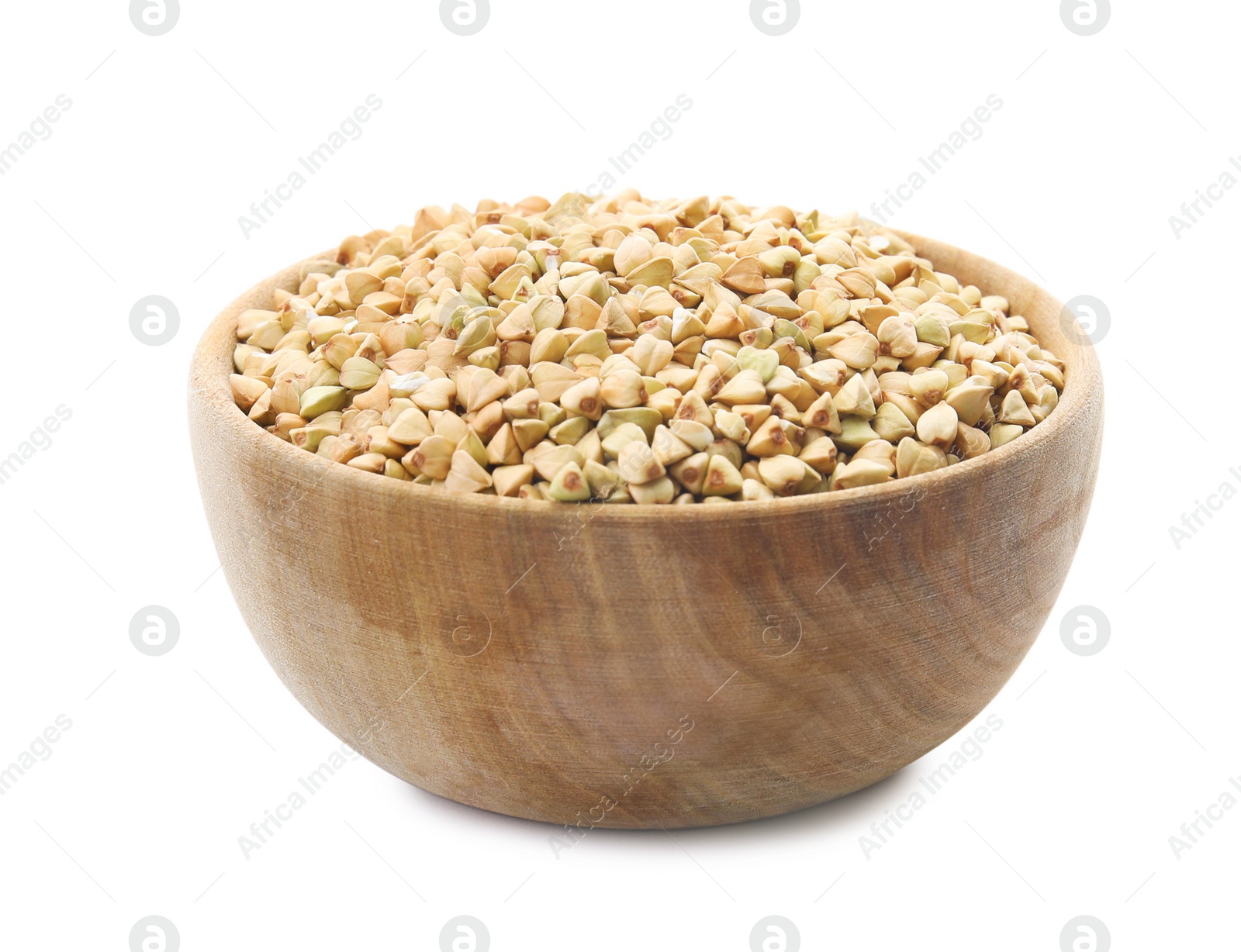 Photo of Uncooked green buckwheat grains in bowl isolated on white