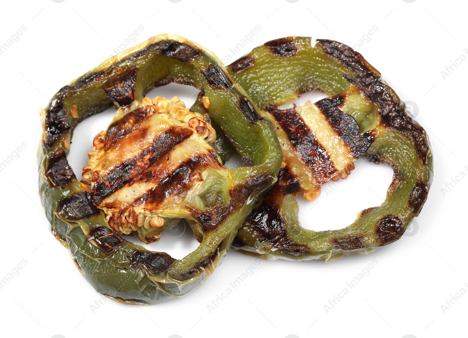 Photo of Slices of grilled green chili pepper isolated on white
