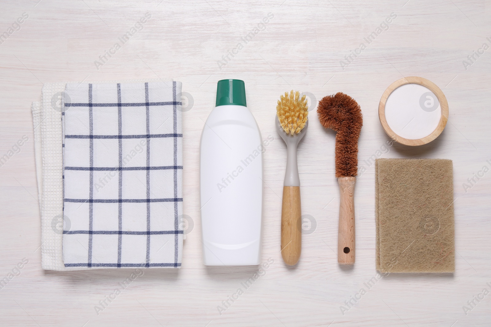 Photo of Flat lay composition with different cleaning supplies on light wooden background