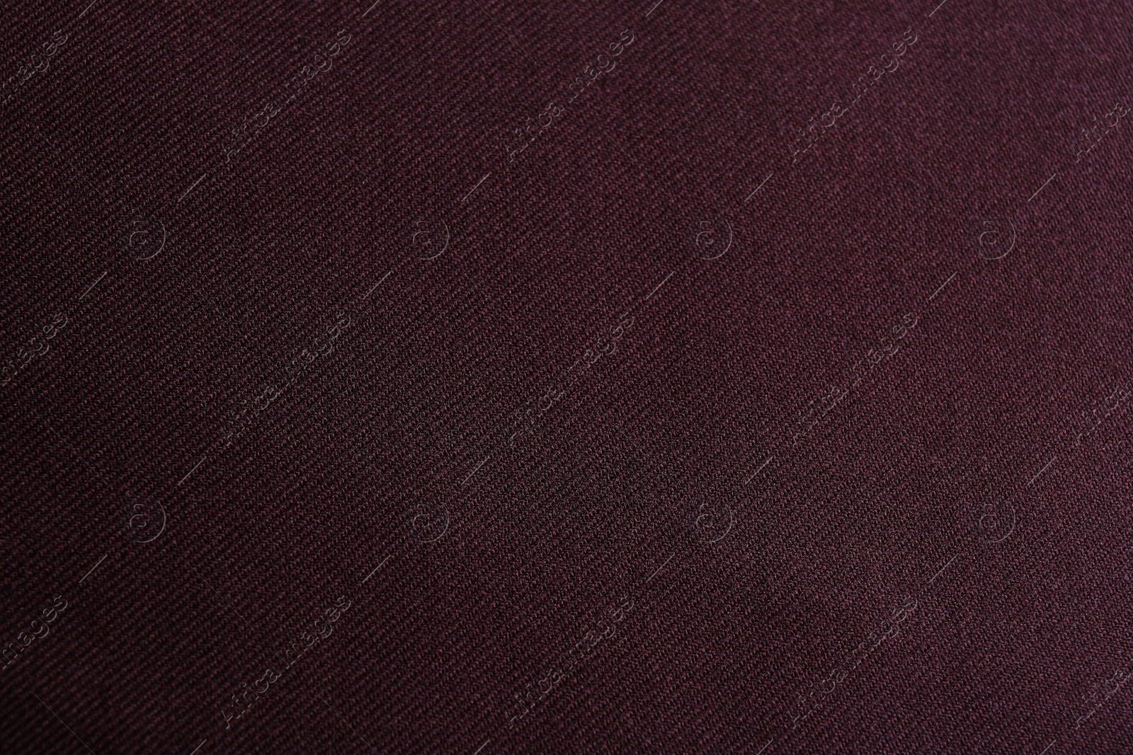 Photo of Texture of beautiful dark red fabric as background, closeup