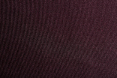 Texture of beautiful dark red fabric as background, closeup