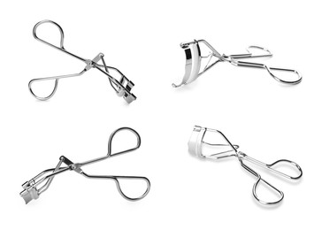 Image of Set with eyelash curlers on white background 