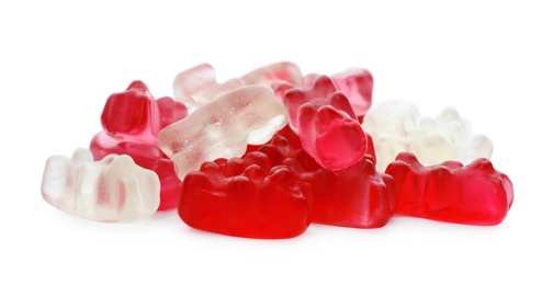 Pile of delicious jelly bears on white background