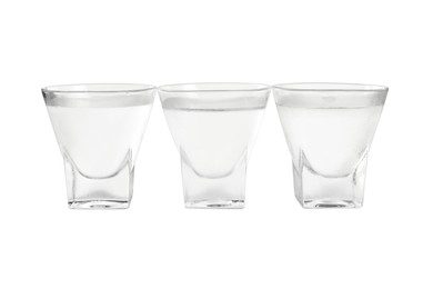 Photo of Vodka in shot glasses on white background