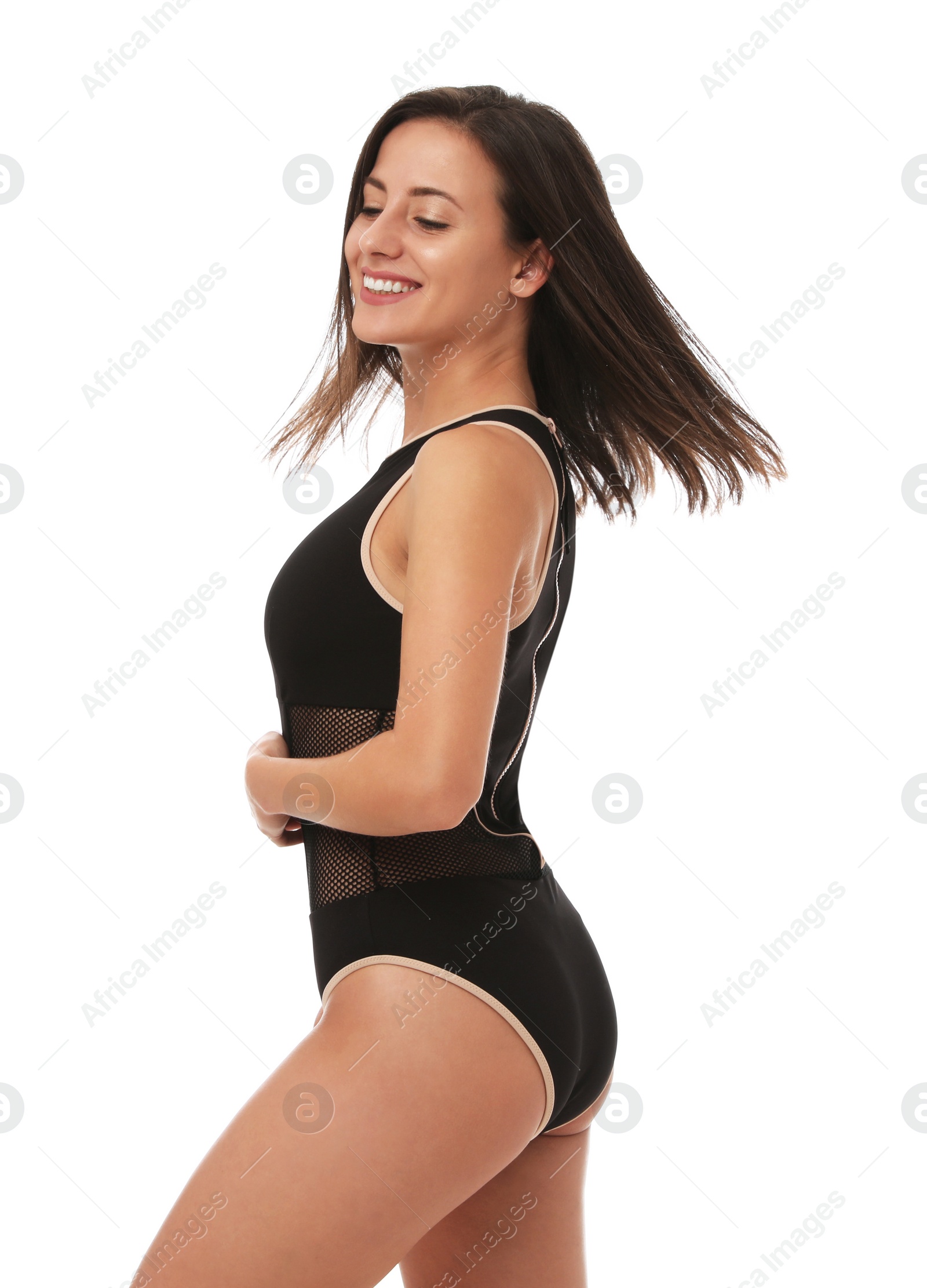 Photo of Pretty sexy woman with slim body in stylish black bikini on white background