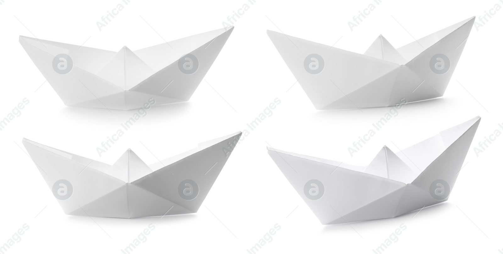 Image of Set with paper boats on white background