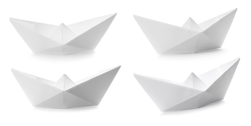 Image of Set with paper boats on white background