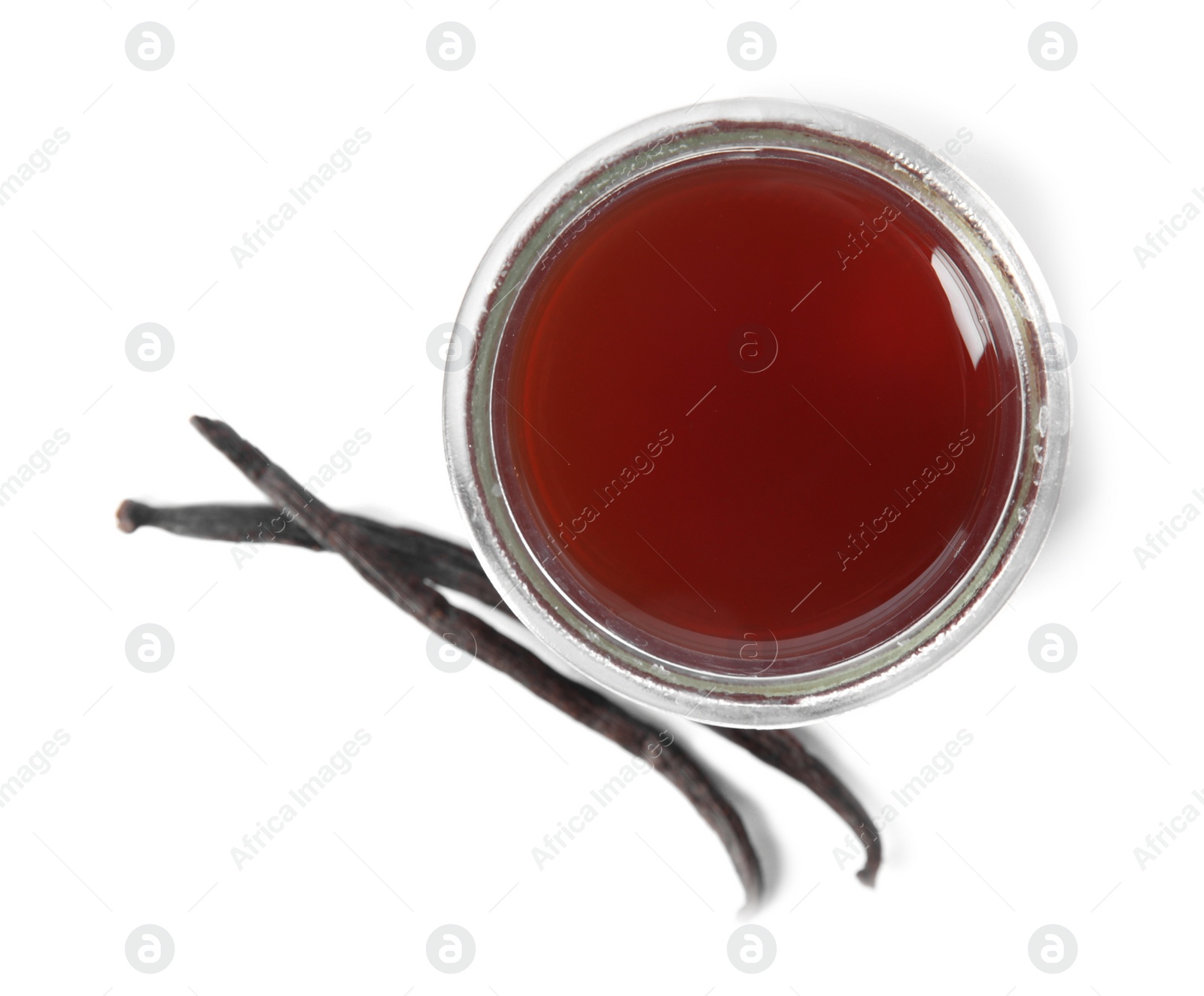 Photo of Vanilla extract and dry pods isolated on white, top view