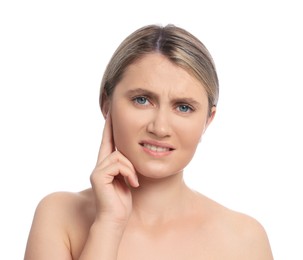 Photo of Young woman suffering from ear pain on white background