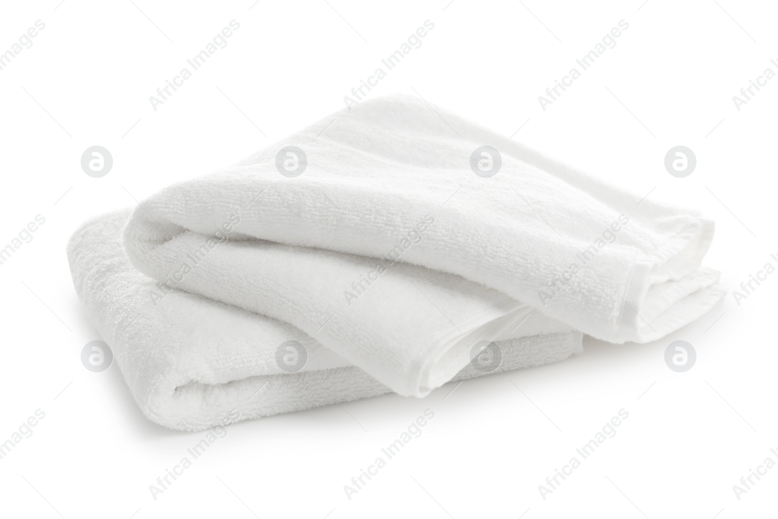 Photo of Folded clean soft towels on white background