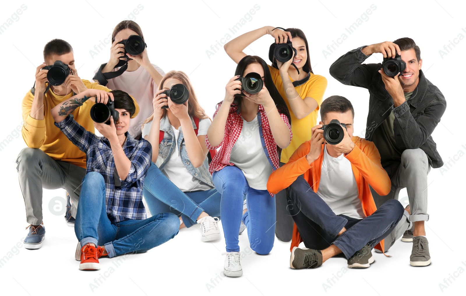 Image of Group of professional photographers with cameras on white background