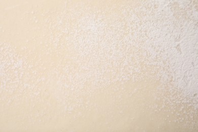 Photo of Raw puff pastry dough as background, top view