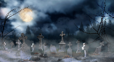 Image of Misty cemetery with old creepy headstones under full moon. Halloween banner design