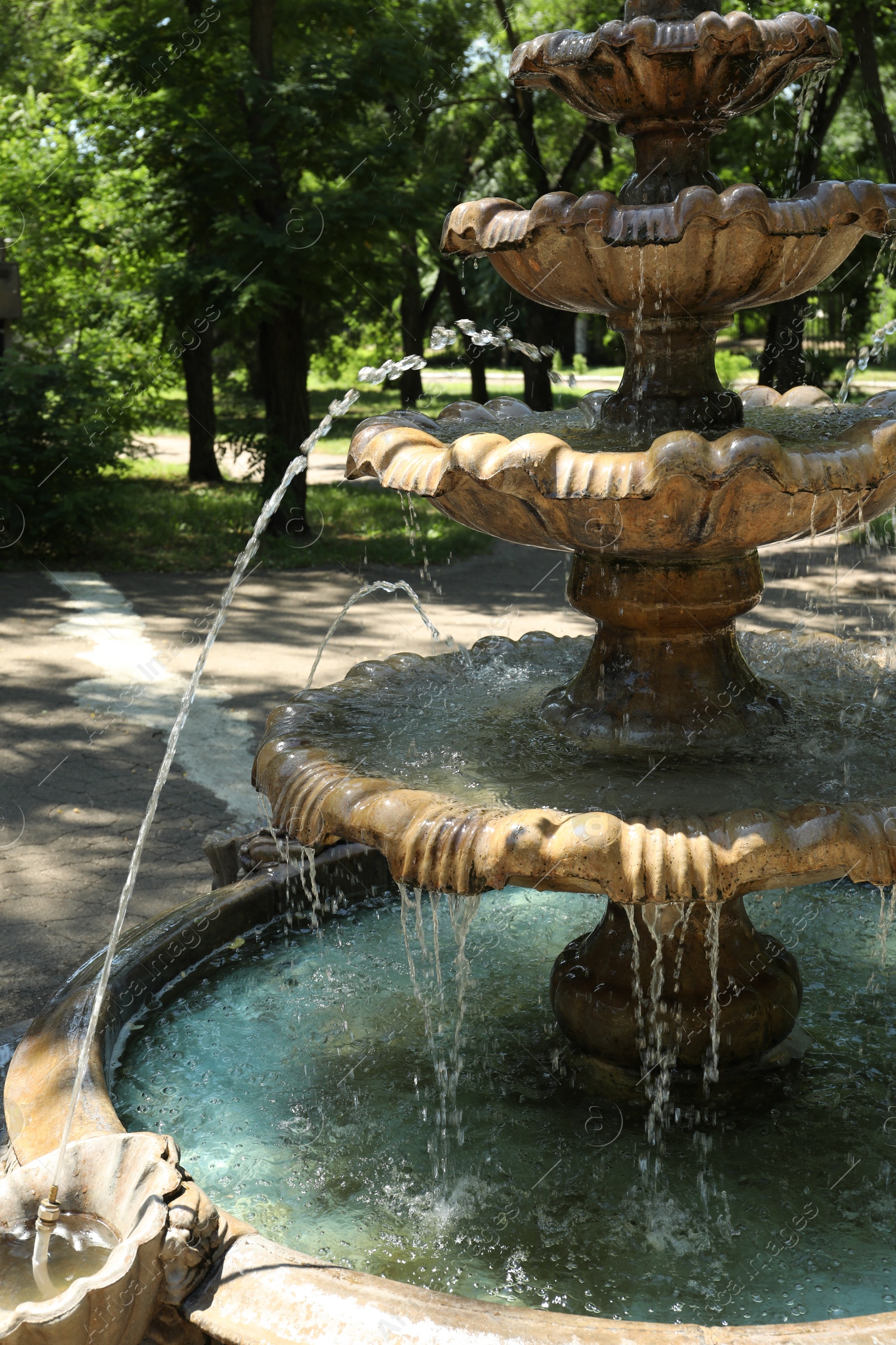 Photo of Beautiful view of fountain in park on sunny day