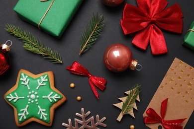 Flat lay composition with Christmas decor on black background