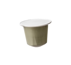 Photo of One plastic coffee capsule isolated on white