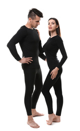 Couple wearing thermal underwear isolated on white