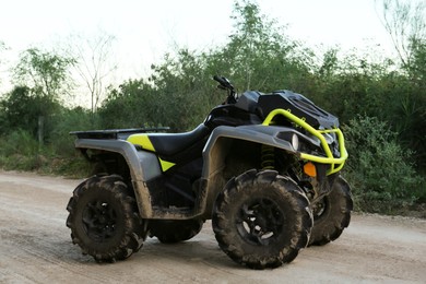 Modern fast quad bike on pathway outdoors