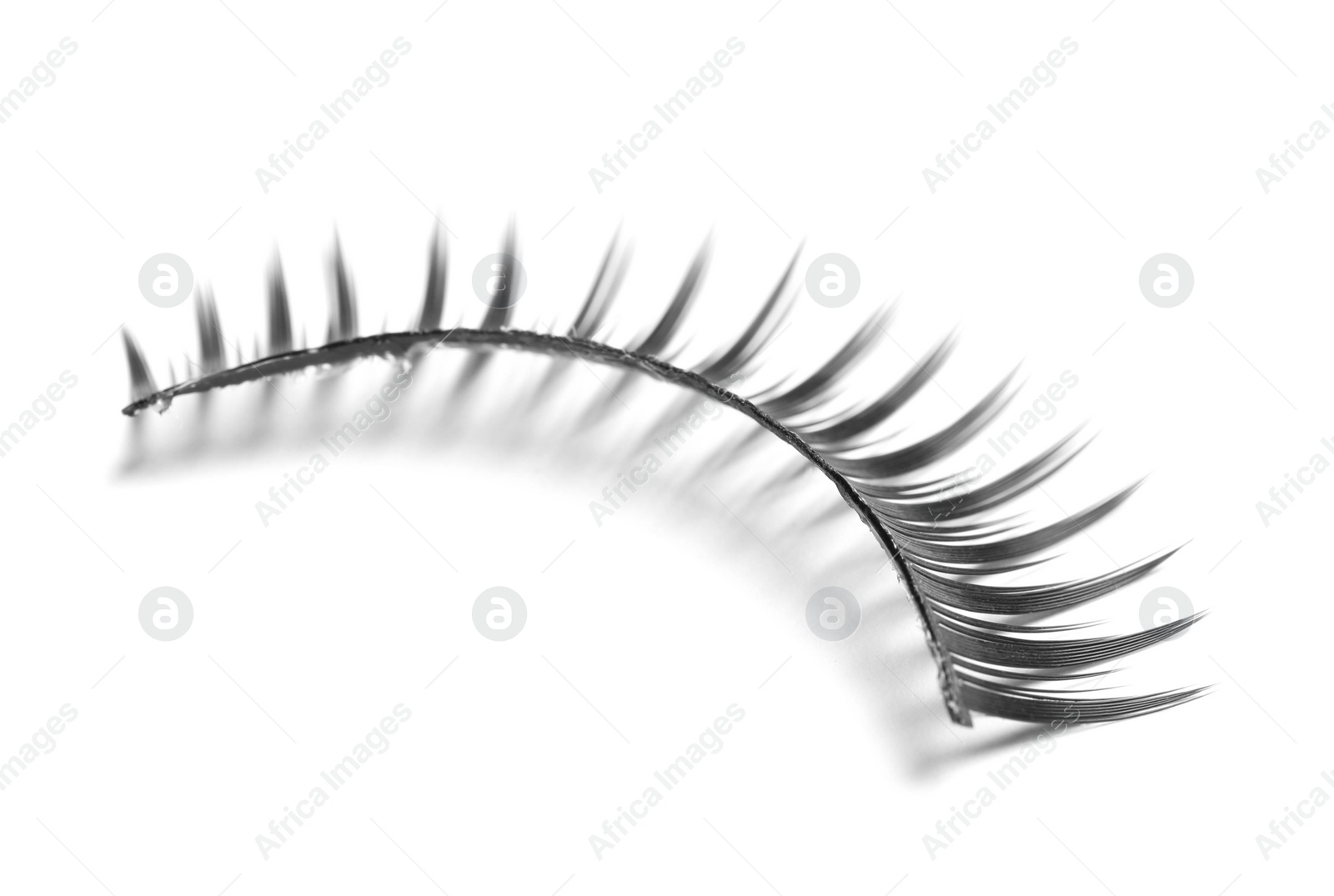 Photo of False eyelashes on white background