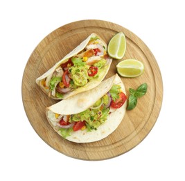 Delicious tacos with guacamole, meat, vegetables and slices of lime isolated on white, top view