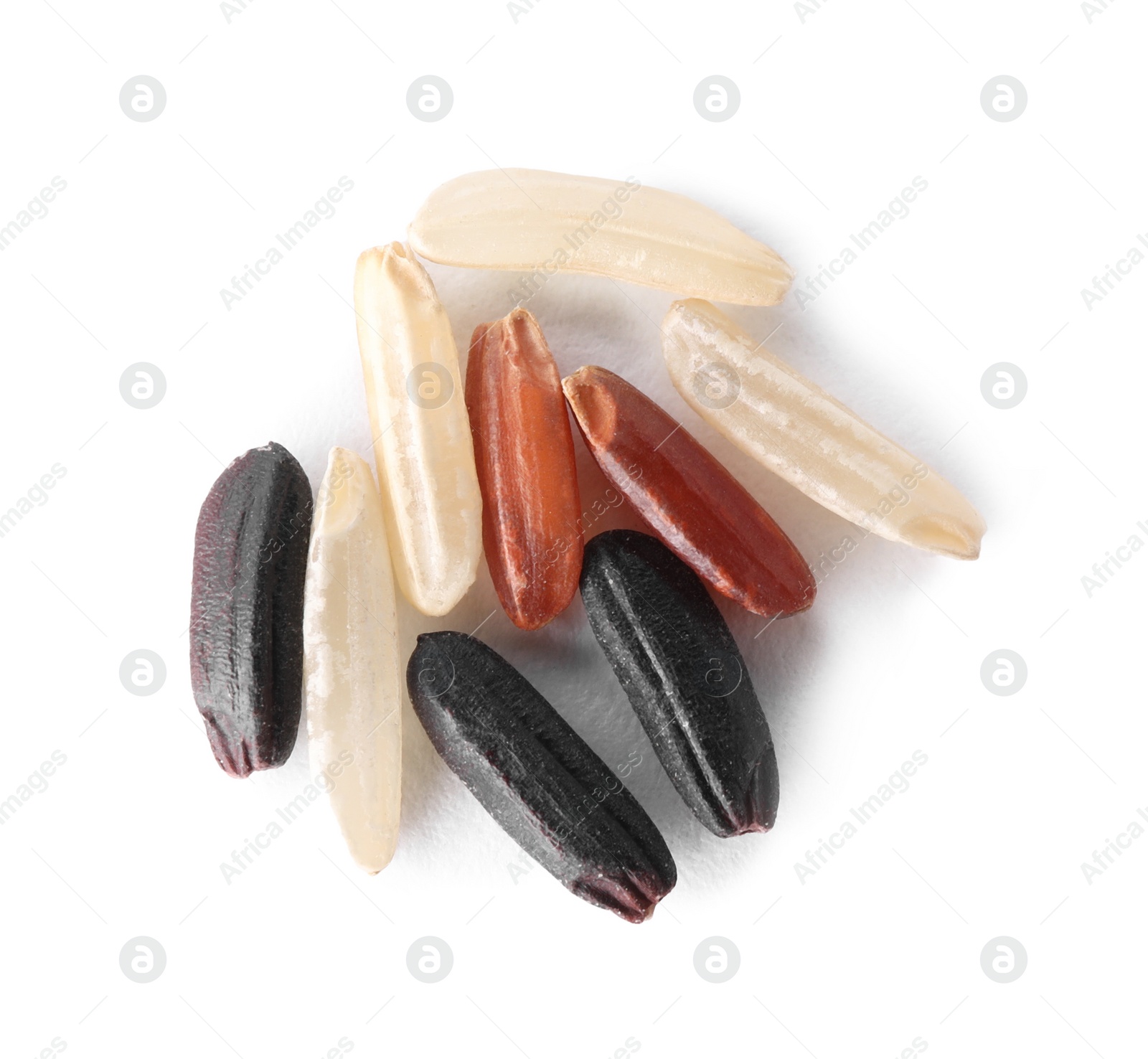 Photo of Different sorts of brown rice isolated on white, top view