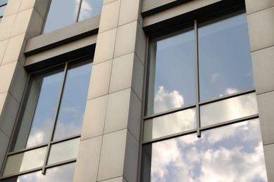 Modern office building with tinted windows. Urban architecture