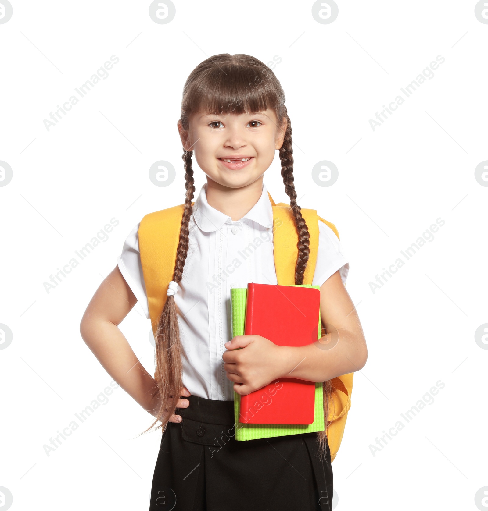 Photo of Cute girl with school stationery on white background