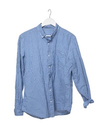 Photo of Crumpled light blue gingham shirt on hanger against white background
