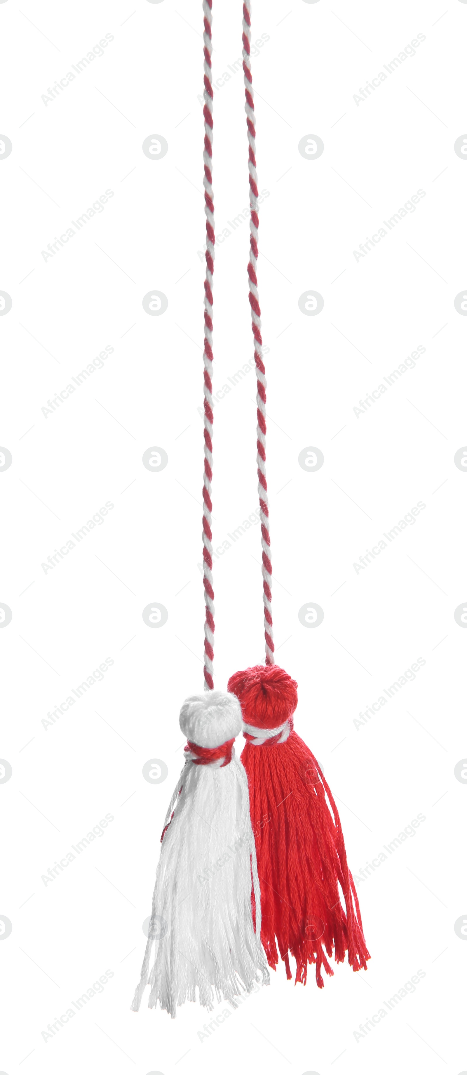 Photo of Traditional martisor on white background. Beginning of spring celebration