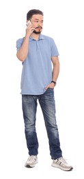 Photo of Man talking on phone against white background