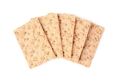 Photo of Fresh crunchy crispbreads on white background, top view