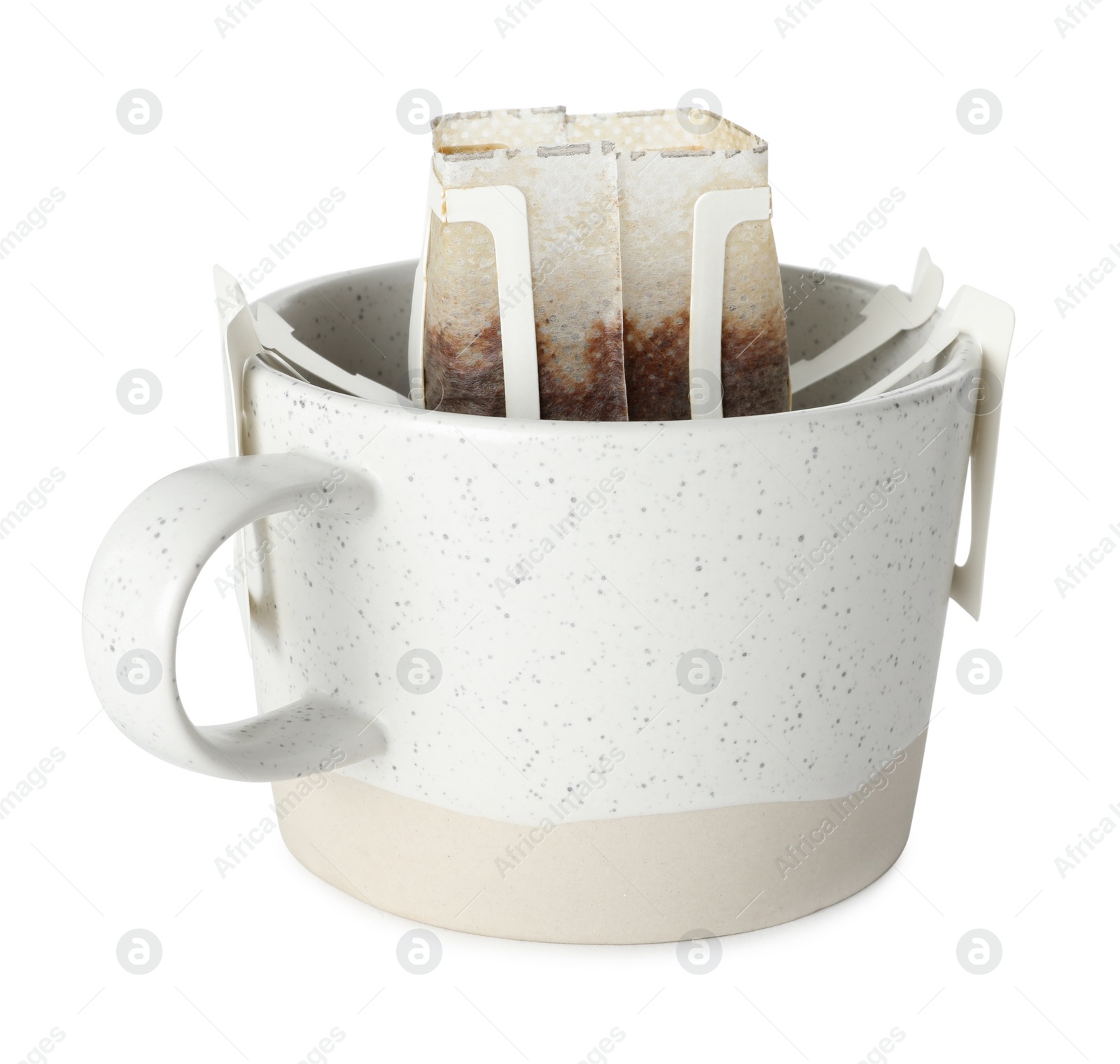 Photo of Cup with drip coffee bag isolated on white