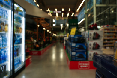 Photo of Blurred view of shopping mall interior. Bokeh effect