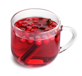 Tasty hot cranberry tea with cinnamon in glass cup on white background