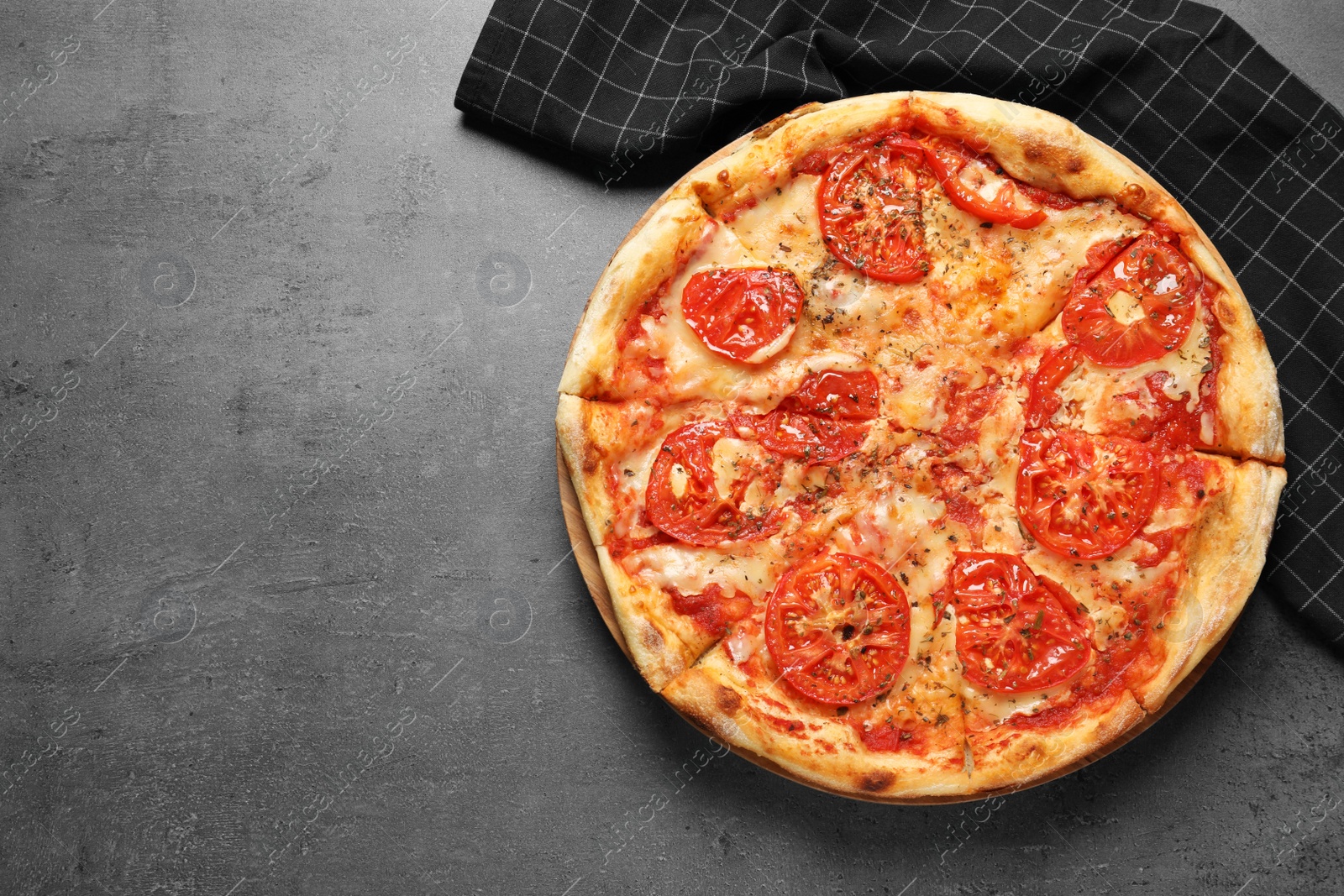 Photo of Hot cheese pizza Margherita on grey background, top view. Space for text