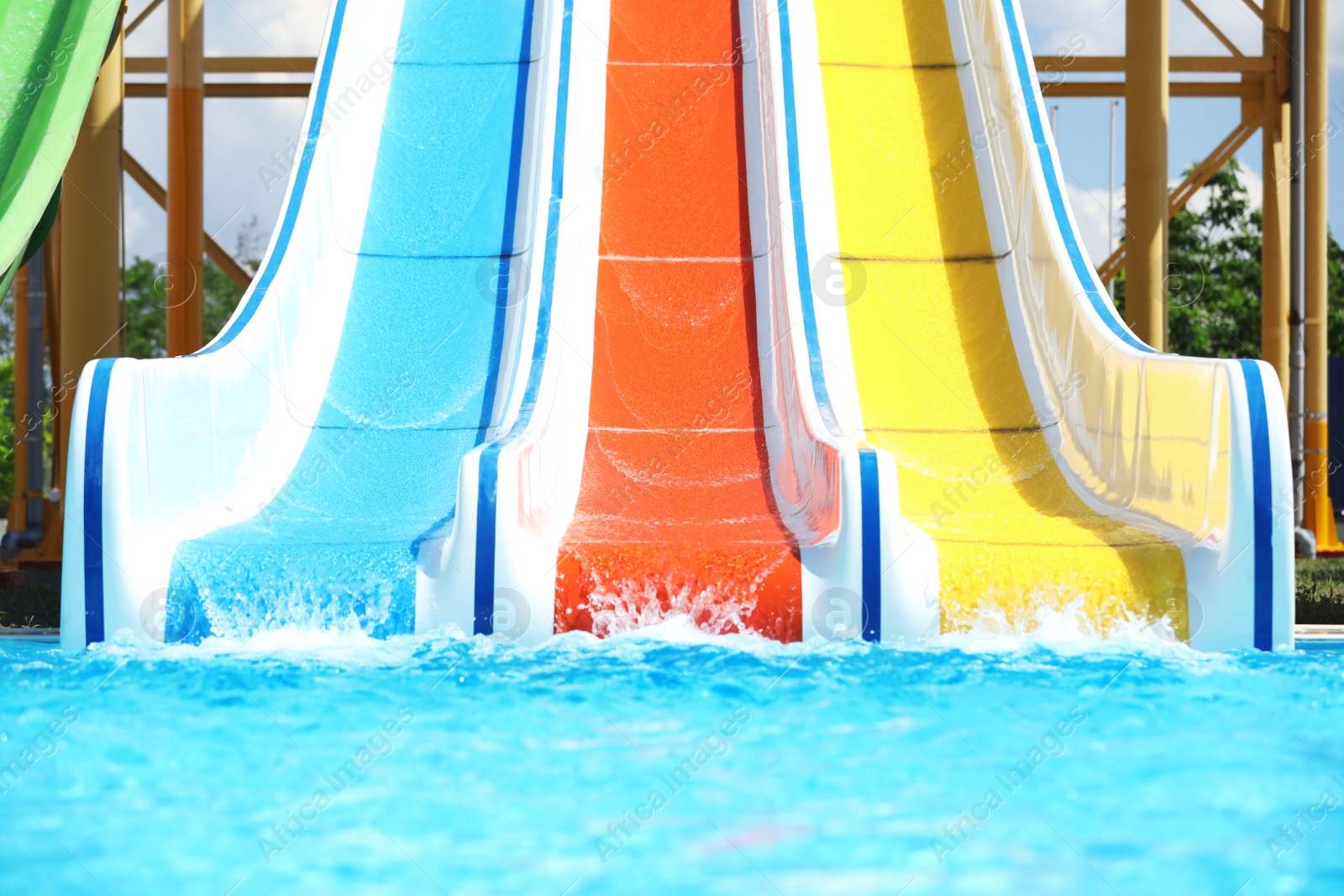 Photo of Water park with colorful slides. Summer vacation