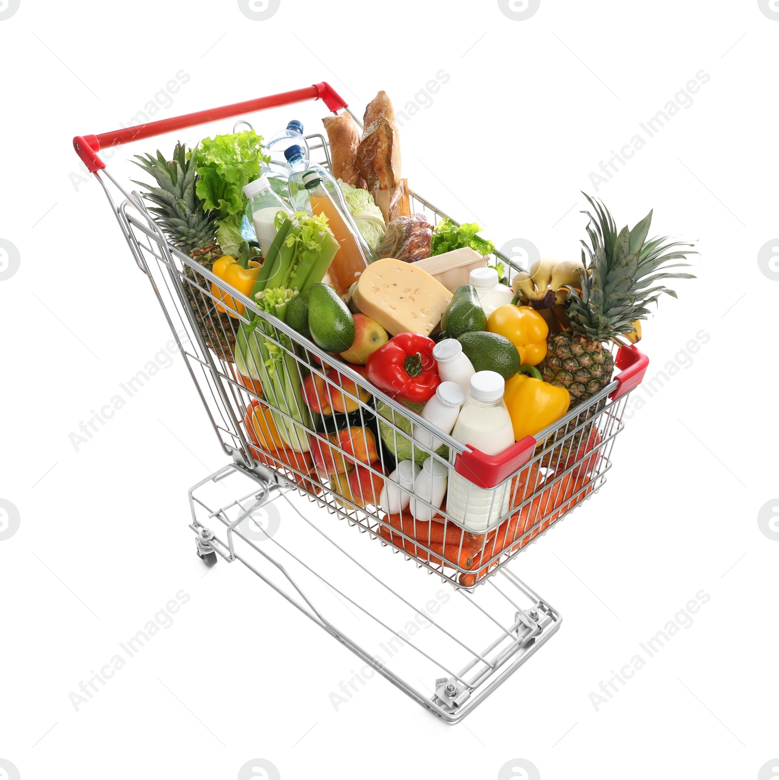 Photo of Shopping cart with groceries on white background