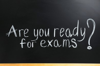Photo of Blackboard with phrase Are You Ready For Exams as background