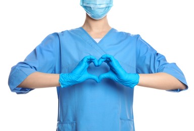 Photo of Doctor showing heart on white background, closeup