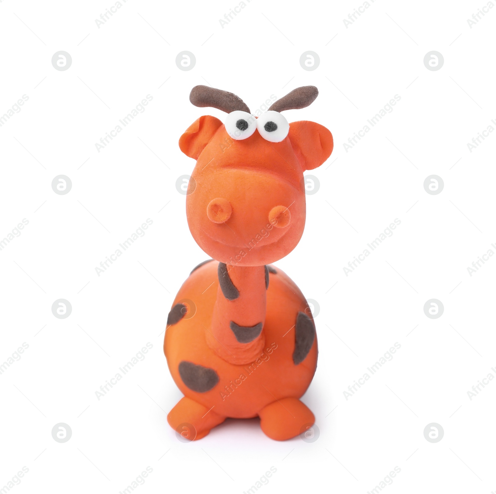 Photo of Small giraffe made from play dough on white background