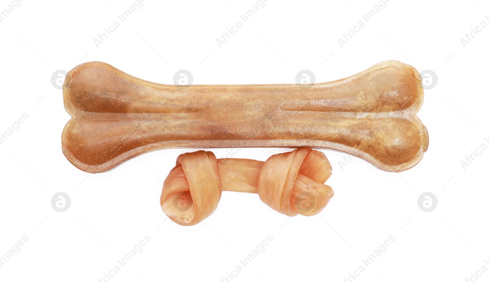Photo of Two bone dog treats isolated on white, top view