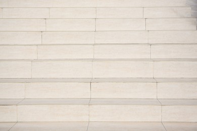 View of beige stone stairs outdoors, closeup